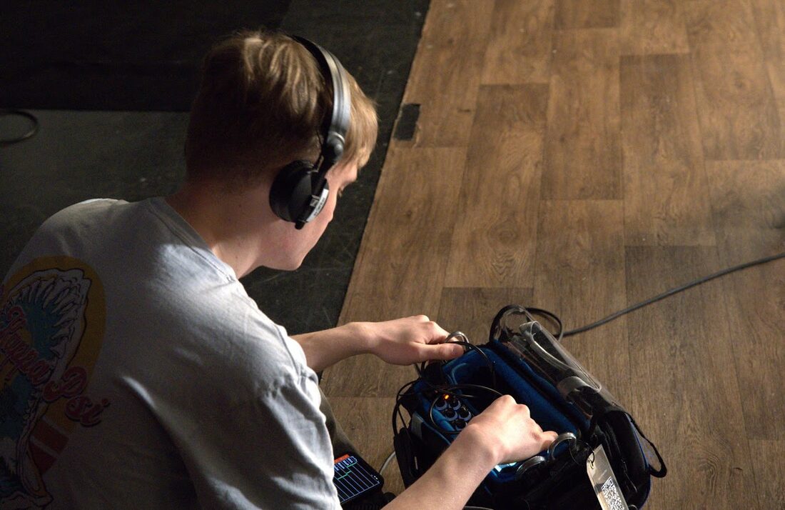 Daniel Friend mixing on a sound recorder